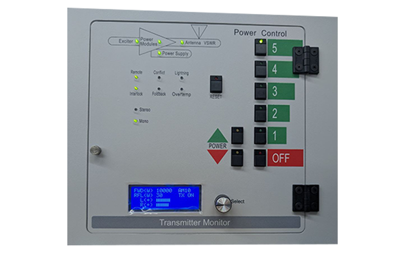 Close-up LCD status display on Broadcast Electronics AM-10A AM transmitter monitor panel showing forward and reflected power readings.
