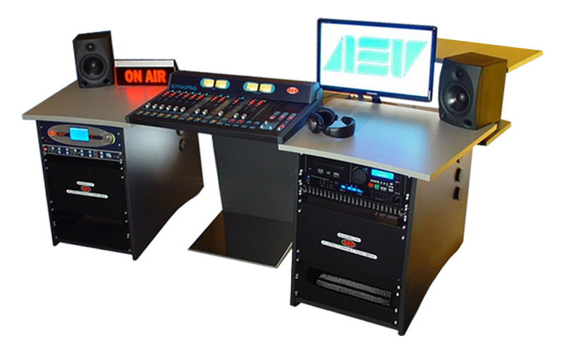 AEV Synapse Digital radio studio package with modular Synapse broadcast console, dual rack cabinets, studio monitors, On Air light and computer workstation on grey desk.